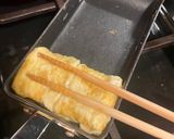 A picture of step 4 of Japanese seaweed tamagoyaki - rolled omelette.
