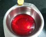 A picture of step 3 of Hibiscus Thai rice balls dunk in coconut milk.