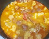 A picture of step 11 of Phulkopi,aloo diye Chhanar Dalna.