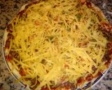 A picture of step 9 of Homemade pizza with minced beef and cheese topping.