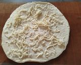 Foto del paso 9 de la receta Pizza Extra Fina con Pollo un Poco de Especias y Queso