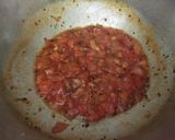A picture of step 1 of Bengali style tomato chutney.