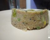 A picture of step 3 of Upma with lots of veggies.