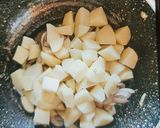 A picture of step 3 of Aloo palak.