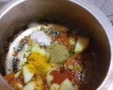 A picture of step 3 of Rote with spicy aloo gravy.