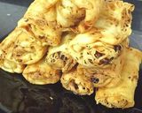 A picture of step 7 of Malaysian net crepes with Indian stuffed chicken.