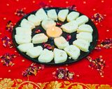 A picture of step 7 of Fireless Coconut Stuffed Burfi.