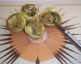Foto del paso 2 de la receta: Medallones de merluza rebozados, setas y alcachofas