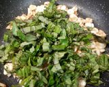 A picture of step 2 of Garlic Bread with fresh basil (no oven bread).