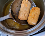 Foto del paso 5 de la receta: Palitos de muzzarella a las finas hierbas
