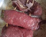 Foto del paso 2 de la receta: Niños envueltos con cebolla y zanahorias relleno de jamón y queso