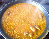 Foto del paso 4 de la receta: Paella sencilla de chipirones en su tinta