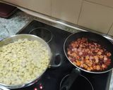 A picture of step 2 of Meat Tortellini with Chorizo and Sausage in Tomato Sauce.