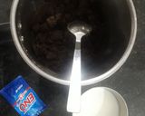 A picture of step 3 of Choco Idli Muffins by Oreo biscuits.