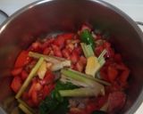 A picture of step 3 of Thai Lemongrass Tomato Seafood Hot and Sour Soup.