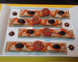 Foto del paso 6 de la receta: Biscotes con ventresca de atún y paté de piquillos