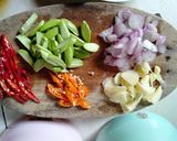 Foto langkah ke 1 dari resep Tumis Daun Pepaya.