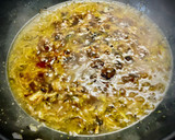 Foto del paso 5 de la receta: Arroz venere con langostinos, shiitake y jamón ibérico