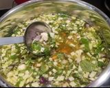 A picture of step 4 of Vegetable Daliya khichdi.