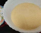 Foto del paso 5 de la receta: Bizcocho de yogur, naranja y cacao