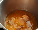 Foto del paso 7 de la receta: Garbanzos con calabaza especiada y costillas