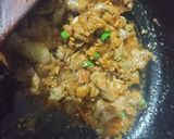 A picture of step 3 of Kaleji and pote of chicken.