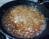 A picture of step 2 of Ranga Aloor Puli Pithe or Sweet Potato Fried Dumplings.