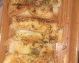 A picture of step 8 of Cheesy garlic bread sticks.