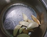 A picture of step 4 of Kathiyawadi Masala Khichdi.