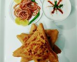 A picture of step 13 of Veg Mughlai Paratha with lacha pyaz and Dahi.