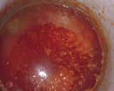 A picture of step 3 of Jollof macaroni with fried boneless fish.