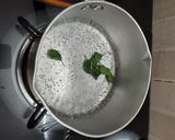 A picture of step 1 of Tulsi chai/ holy basil leaves tea.