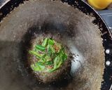 A picture of step 3 of Stuffed brinjal curry.