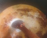 A picture of step 9 of Coconut party jollof rice.