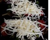 A picture of step 12 of Stuffed Veggie-Mushroom-Tofu Baked Aubergine Boats.