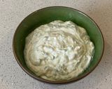 A picture of step 3 of Tzatziki (yoghurt and cucumber dip).