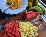 A picture of step 1 of Fruity salad🍉🍊🍍🍌.