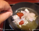 Foto del paso 3 de la receta: Salchichas con tomate especiado