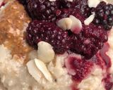A picture of step 3 of Berry and almond porridge -vegan.