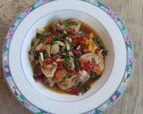 Foto langkah ke 7 dari resep Ayam Tumis Daun Kemangi.
