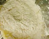 Foto del paso 4 de la receta: PANCITOS DE QUESO EN MUFFINERA (Tipo pan viral montaña rusa)