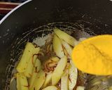 A picture of step 4 of Turmeric Potato Rice 🍚😋.