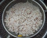 A picture of step 2 of Red Rice Flakes Pudding.
