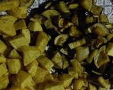 A picture of step 8 of Aaloo Began (Brinjal) Fry.