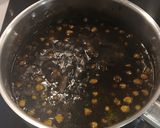 Foto del paso 4 de la receta: Cocina de subsistencia: Garbanzos con Chipirones en su tinta
