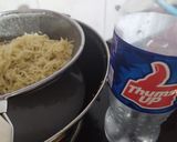 A picture of step 2 of Spicy maggi.