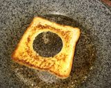 A picture of step 3 of Egg in toasted bread.