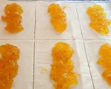 Foto del paso 4 de la receta: Cañas de hojaldre rellenas de turrón de chocolate y mermelada de naranja