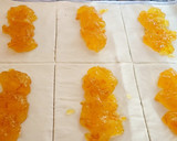 Foto del paso 4 de la receta: Cañas de hojaldre rellenas de turrón de chocolate y mermelada de naranja