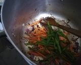 A picture of step 4 of Spicy tumeric rice with chicken strips.